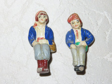 Masse Figuren sitzendes Paar!